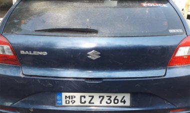 पुलिस लिखी कार में अवैध शराब की तस्करी